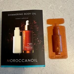 Sample, brand new. Moroccanoil shimmer body oil.